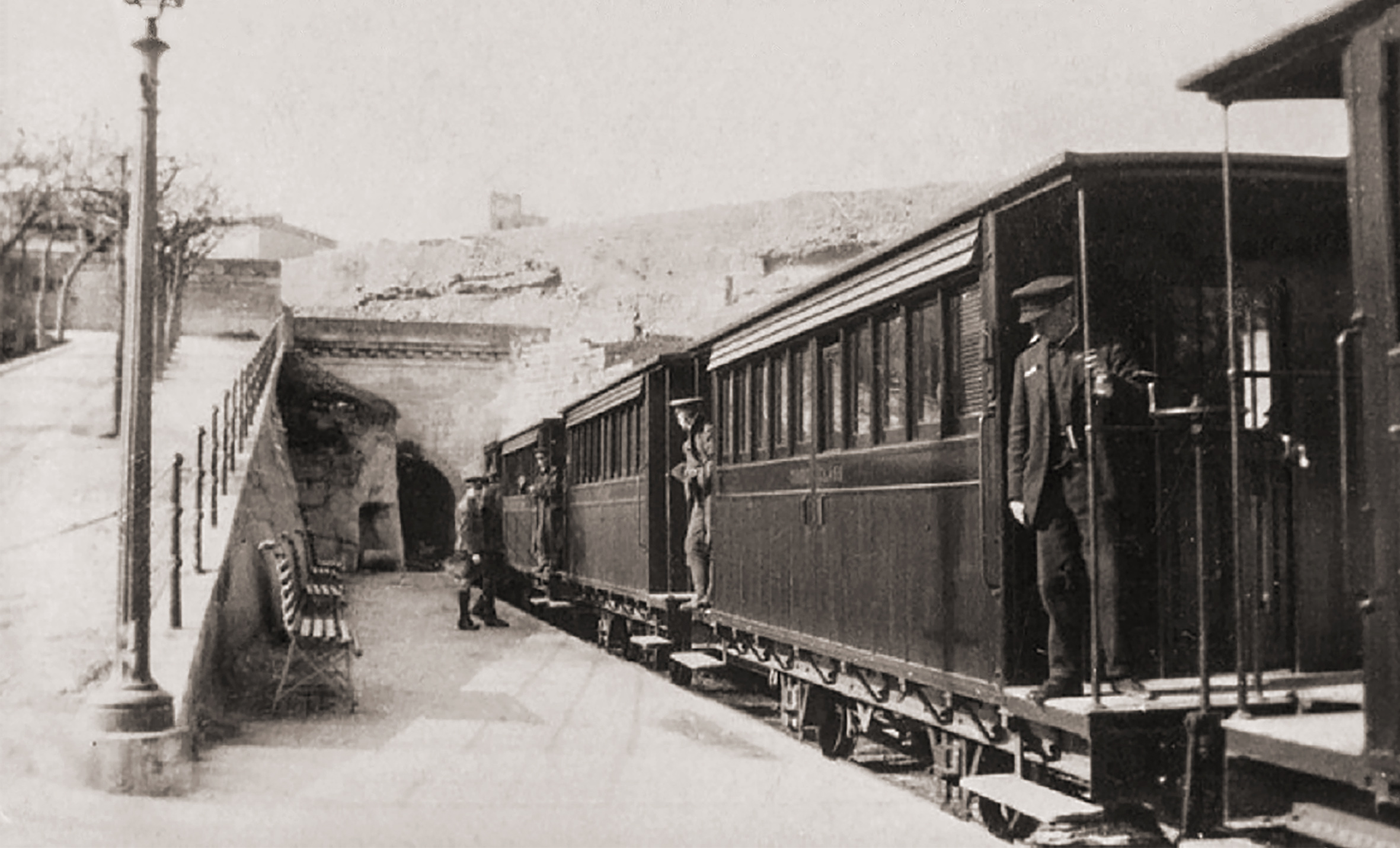 A train pauses at Notabile station  in about 1915 before its onward journey to Museum. The ramp on the left led up to Racecourse Road and was planted with lines of trees as part of Buhagiar's greening of the Railway's stations.